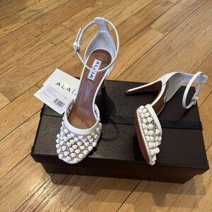 Alaia Leather Embellished-Mesh Pumps